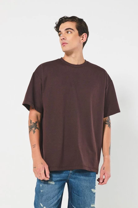 Camiseta unicolor oversize con manga corta y hombro rodado