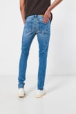 Jean azul claro súper skinny tiro bajo con desgastes sutiles