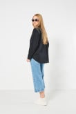 Blusa unicolor oversize con manga larga y botones