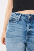 Short súper tiro alto azul en jean con rotos y bolsillos