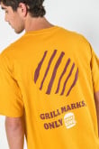 Camiseta amarilla oversize con diseños de Burger King