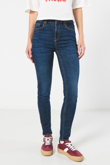 Jean jegging ajustado azul oscuro tiro alto con bolsillos