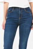 Jean jegging ajustado azul oscuro tiro alto con bolsillos