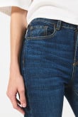 Jean jegging ajustado azul oscuro tiro alto con bolsillos