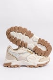 Tenis chunky, color crema suave con contrastes kaki claro.