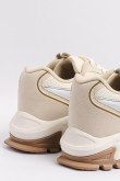 Tenis chunky, color crema suave con contrastes kaki claro.