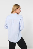 Blusa unicolor a rayas oversize con manga larga