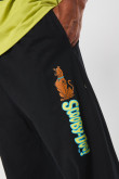 Pantalón jogger negro con diseño de Scooby-Doo y bota recta