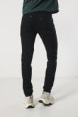 Jean negro skinny con bolsillos, tiro bajo y ajuste ceñido