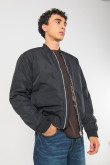 Chaqueta unicolor bomber acolchada con acabados en rib