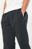 Pantalón unicolor jogger con bolsillos y bota recta