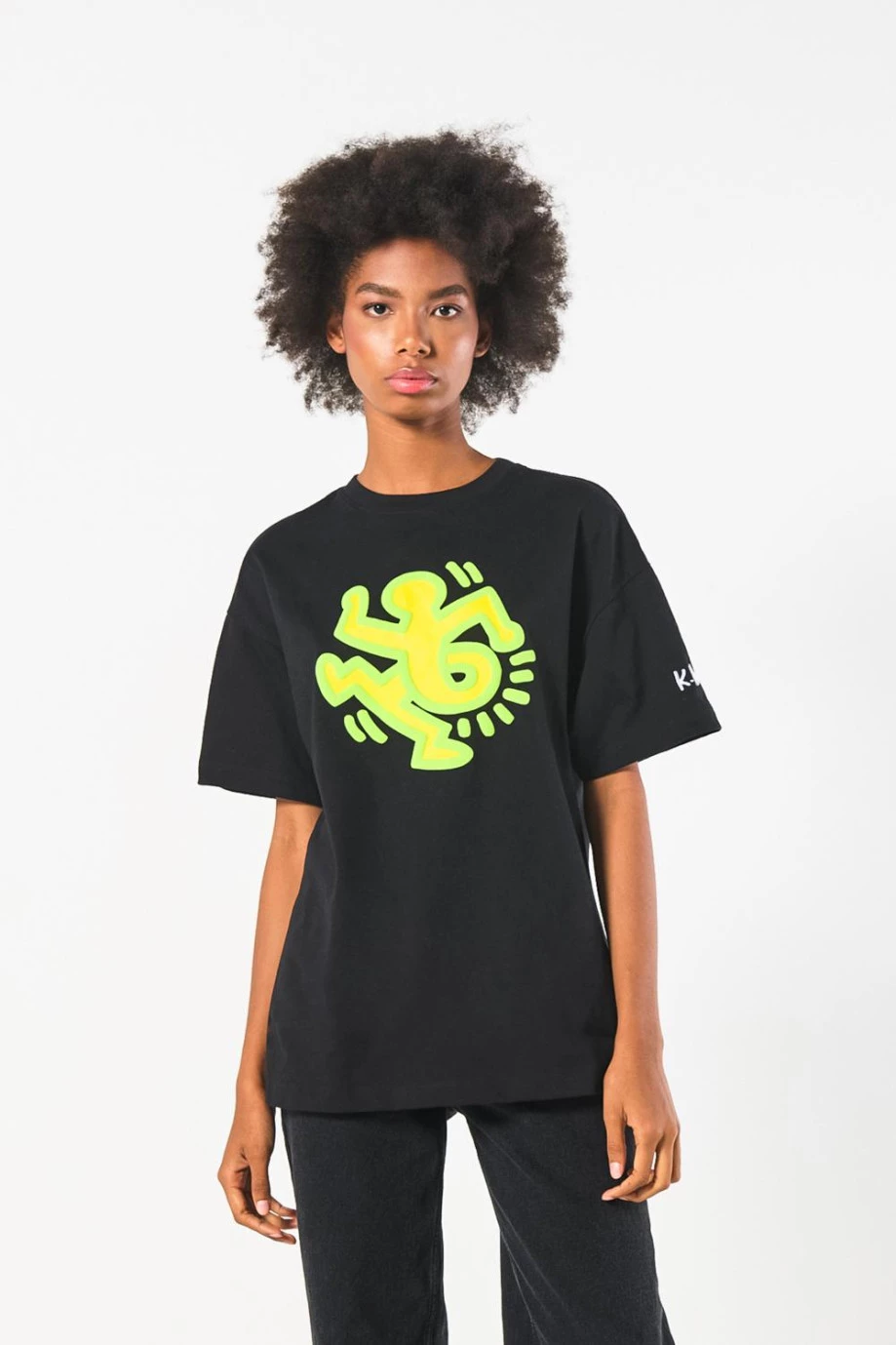 Camiseta manga corta negra oversize con arte de Keith Haring