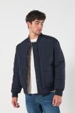 Chaqueta bomber unicolor acolchada doble faz con bolsillos con tapa