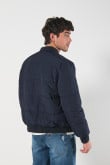 Chaqueta bomber unicolor acolchada doble faz con bolsillos con tapa