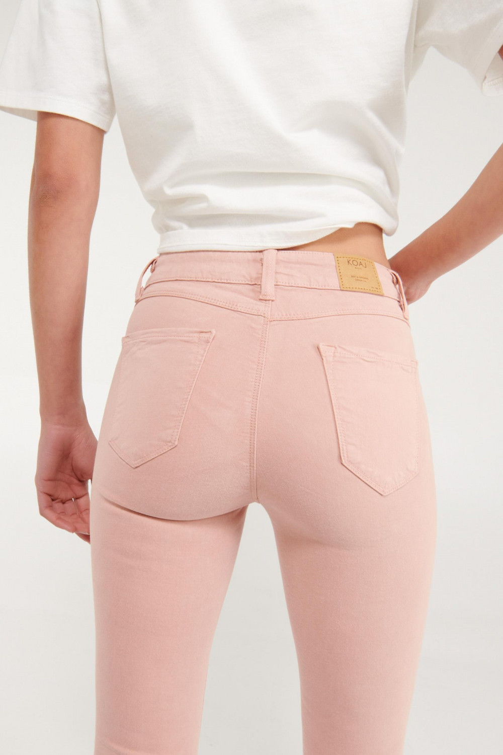 Pantalón jegging rosado claro con tiro alto