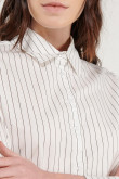 Blusa manga larga unicolor con estampado de rayas y cuello camisero