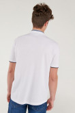 Camiseta Polo unicolor con cuello neru y puños tejidos.