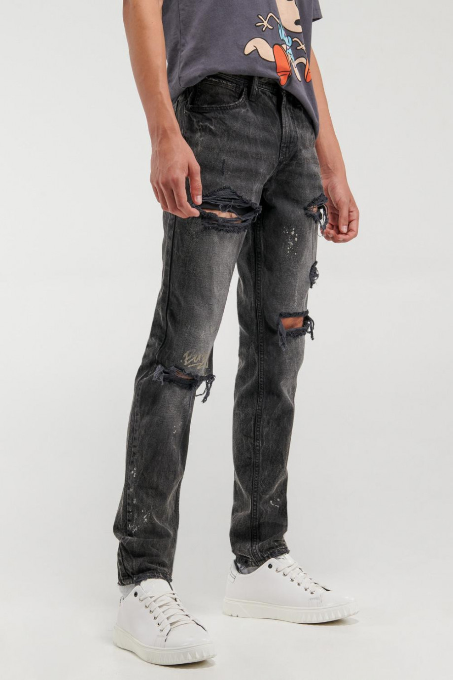 Jean skinny negro tiro bajo con rotos y diseños estampados