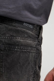Jean skinny negro tiro bajo con rotos y diseños estampados