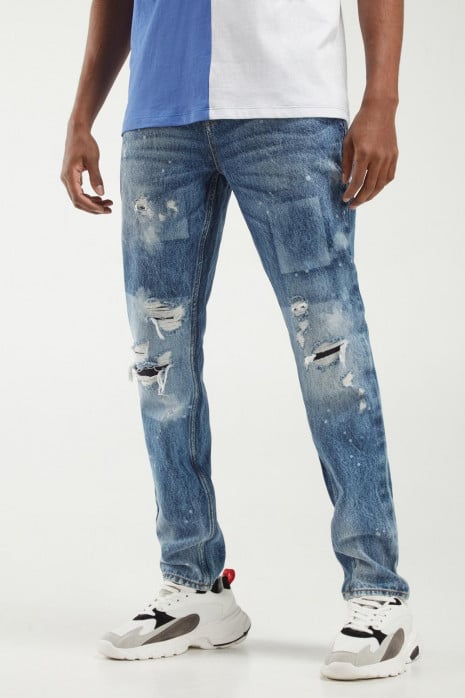 Jean skinny azul medio con rotos, parches detalles en láser