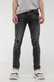 Jean súper skinny gris oscuro con rotos delanteros y desgastes de color