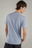 Camiseta azul clara manga corta con estampado de paisajes
